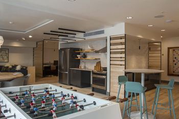 Resident social lounge with catering kitchen and gaming area